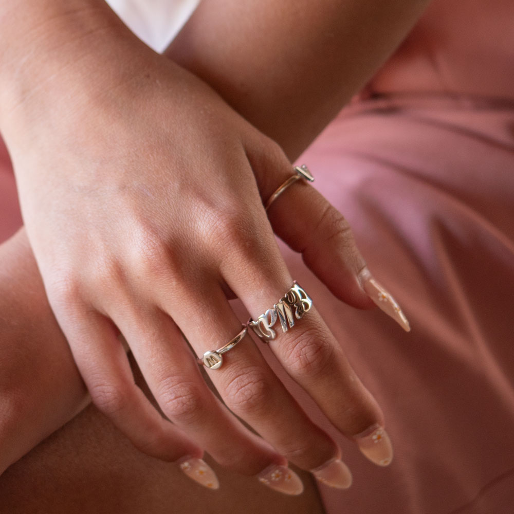 Cursive Name Ring on a model