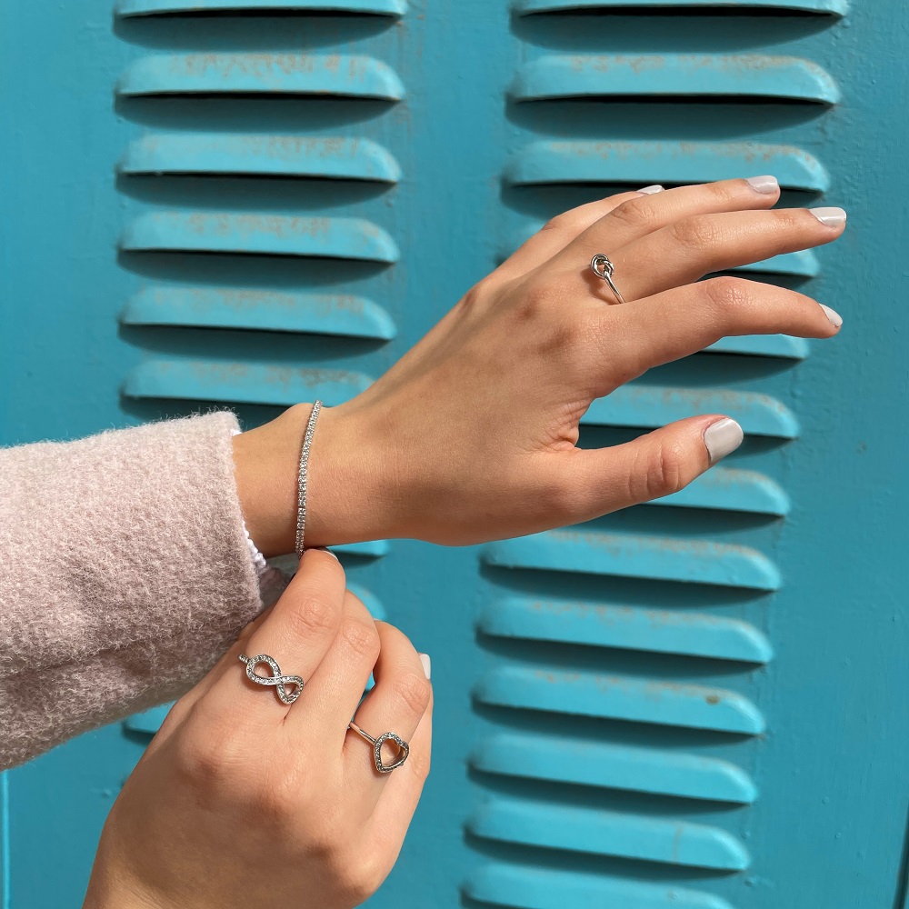 Cubic Zirconia Infinity Ring on a model