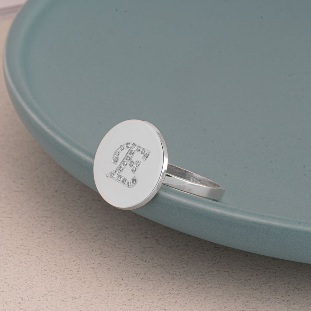 Engraved Initial Round Ring with Cubic Zirconia on a model