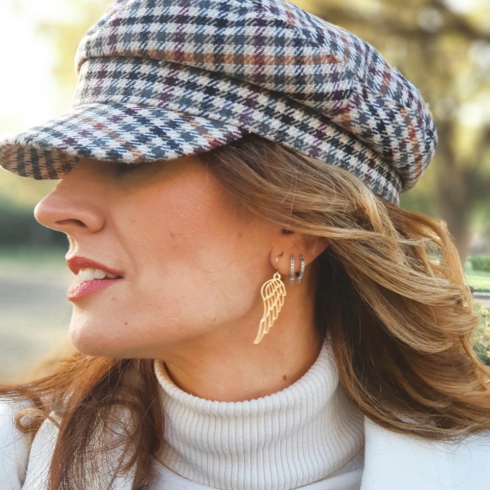 Wing Earrings on a model