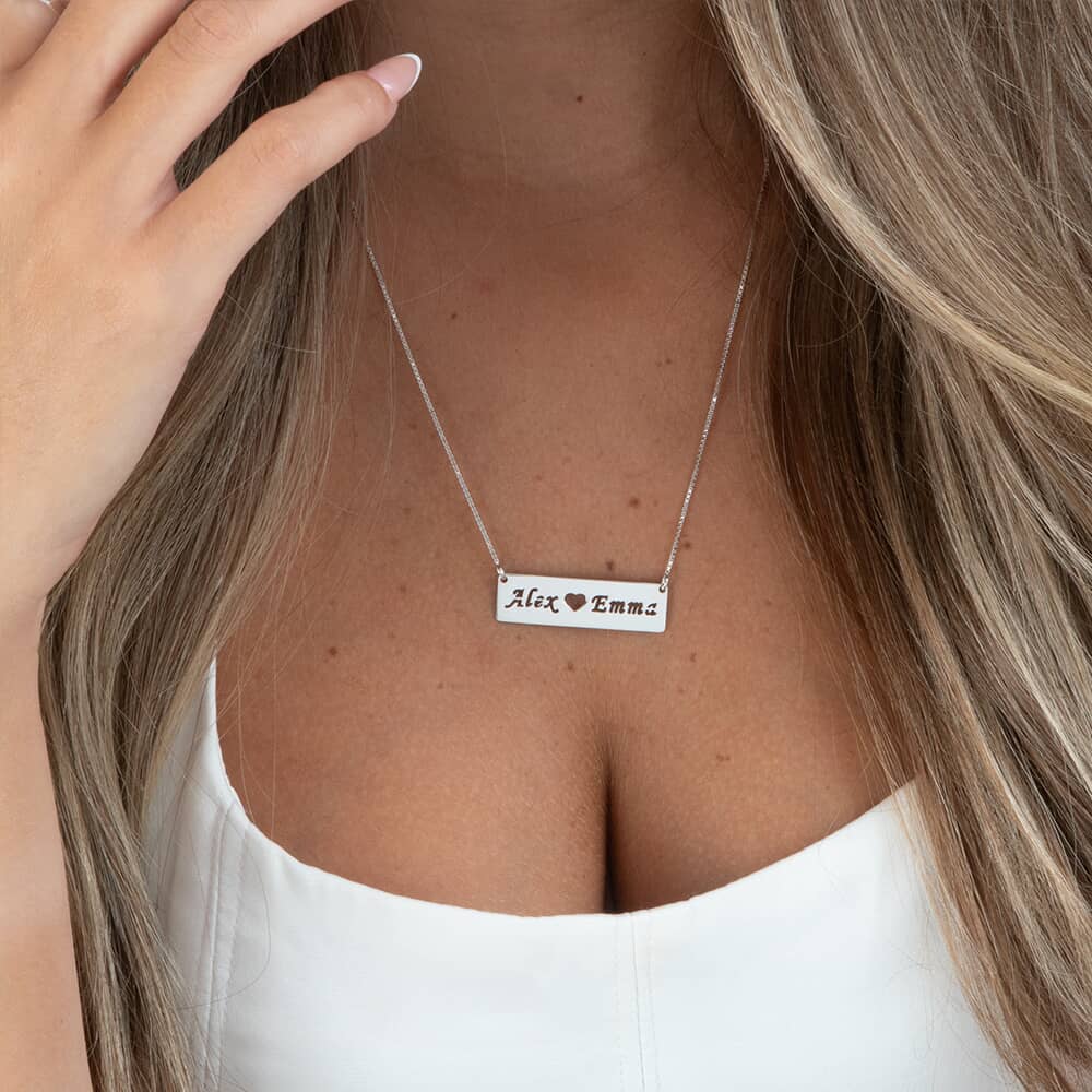 Bar Necklace With Two Cut Out Names on a model - 2
