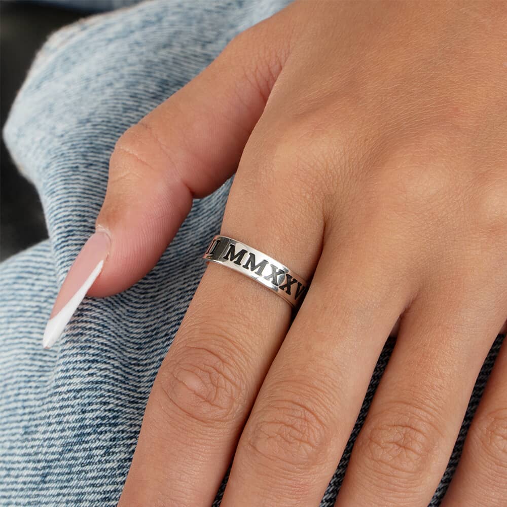 Personalised Roman Numeral Ring on a model