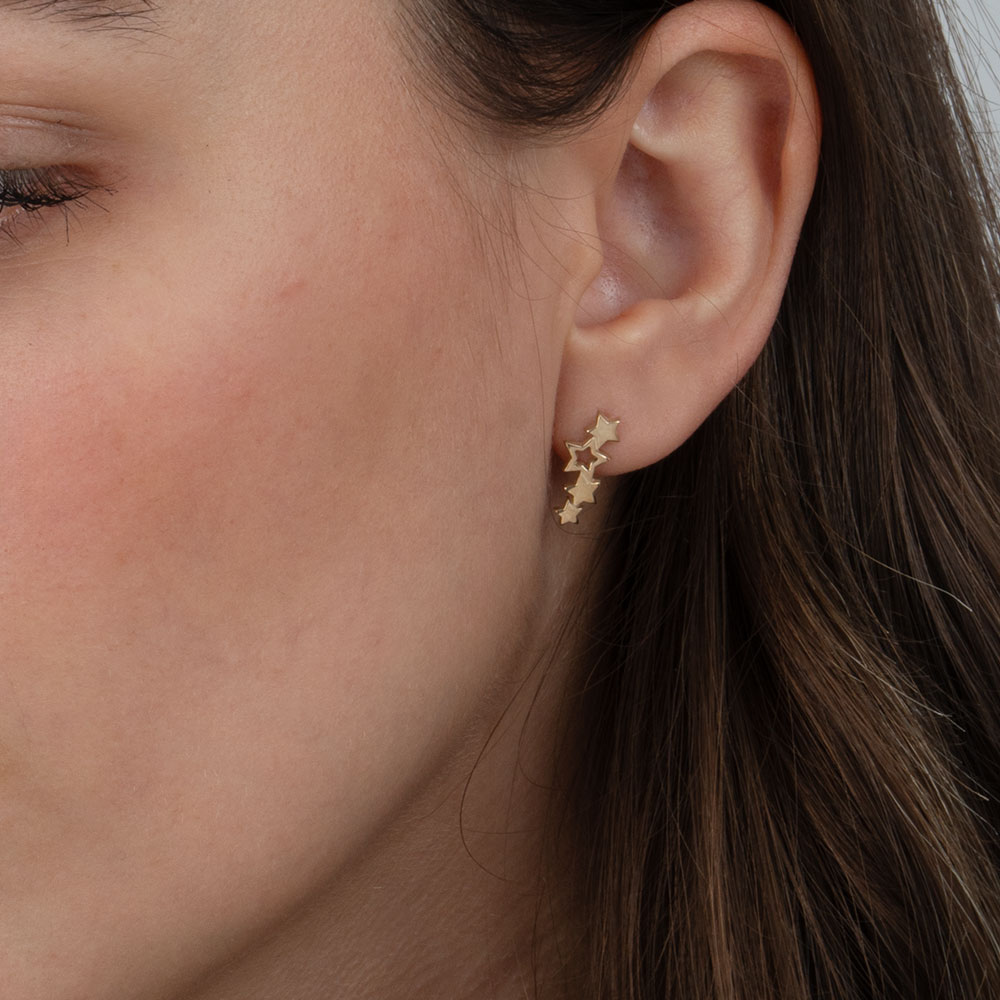 Star Drop Earrings on a model