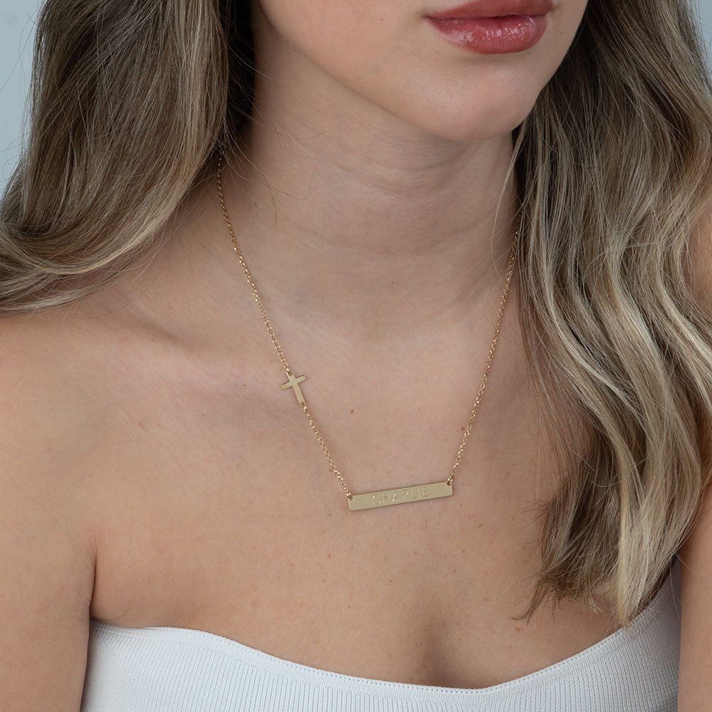 Bar Necklace with Cross Charm on a model