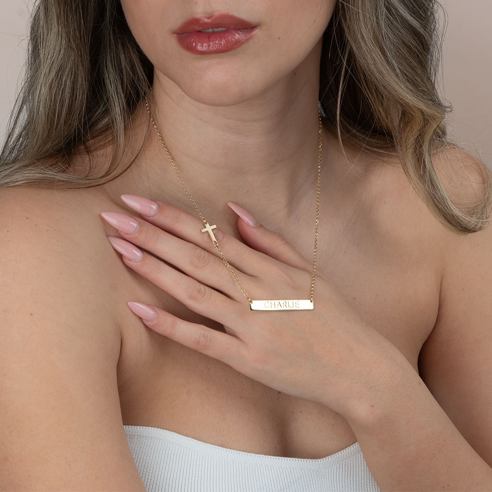 Bar Necklace with Cross Charm on a model - 2