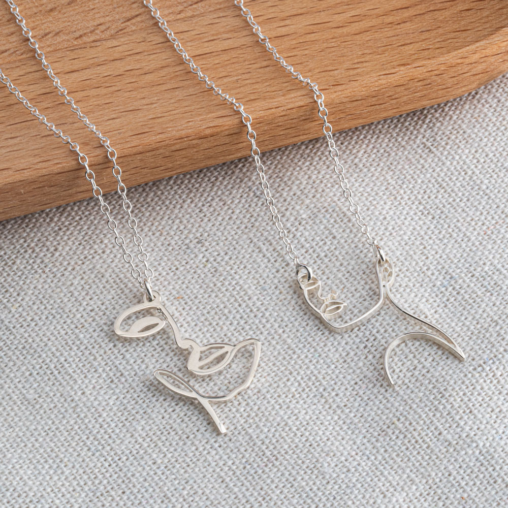 Line Art Strong Woman Necklace on a model