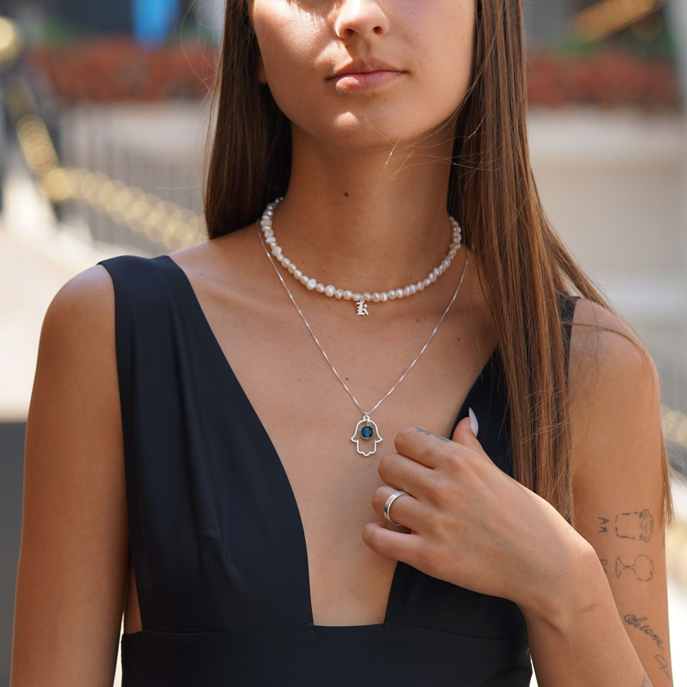 Hamsa Pendant on a model
