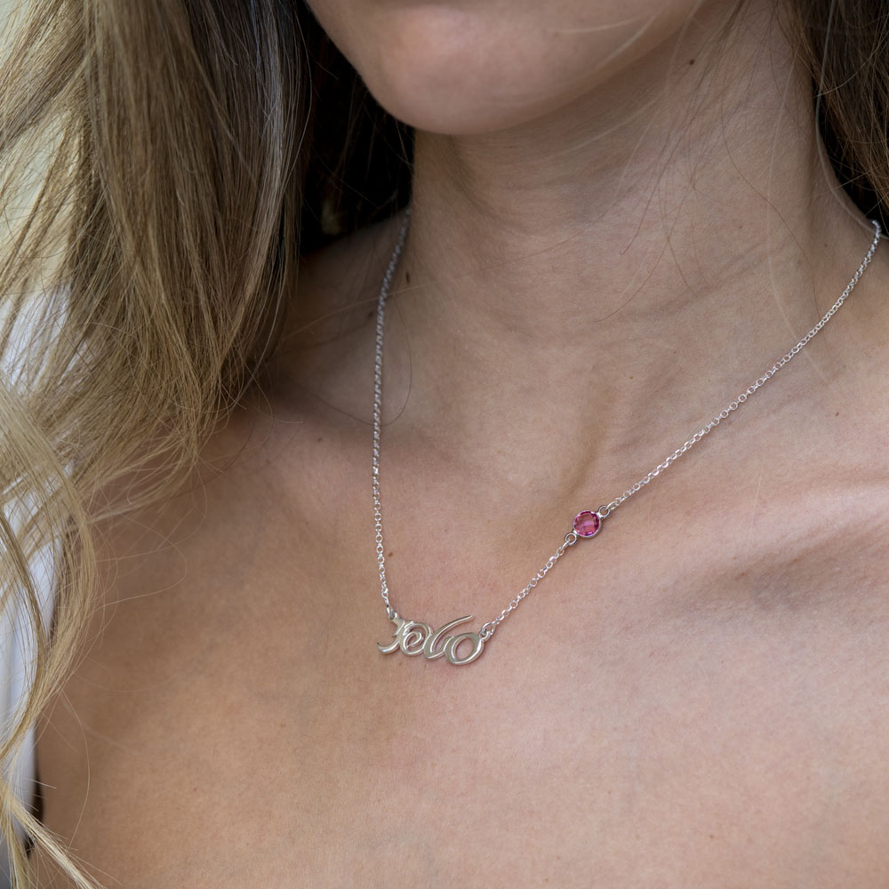 Custom Hebrew Name Necklace on a model - 2