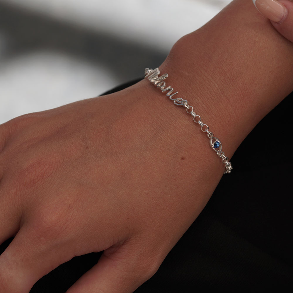 Evil Eye Name Bracelet on a model