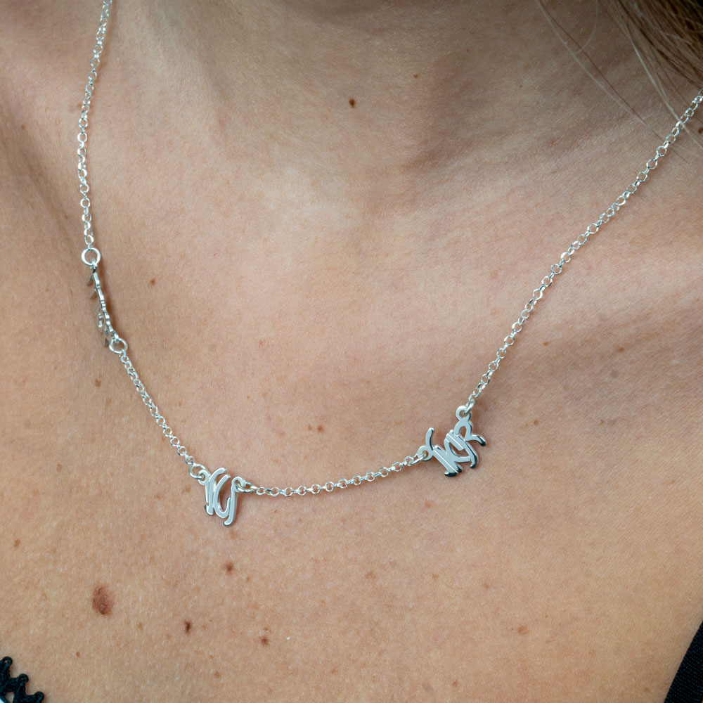 Multiple Hebrew Name Necklace on a model