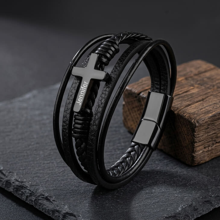 Leather Cross Bracelet for Men highlighting a silver cross against black leather.