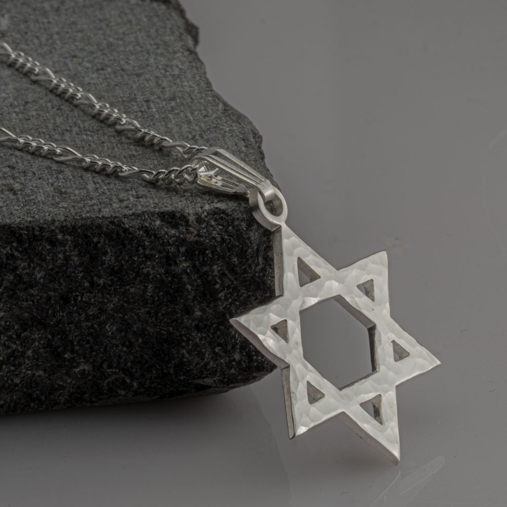 Hammered Star of David Necklace on a model