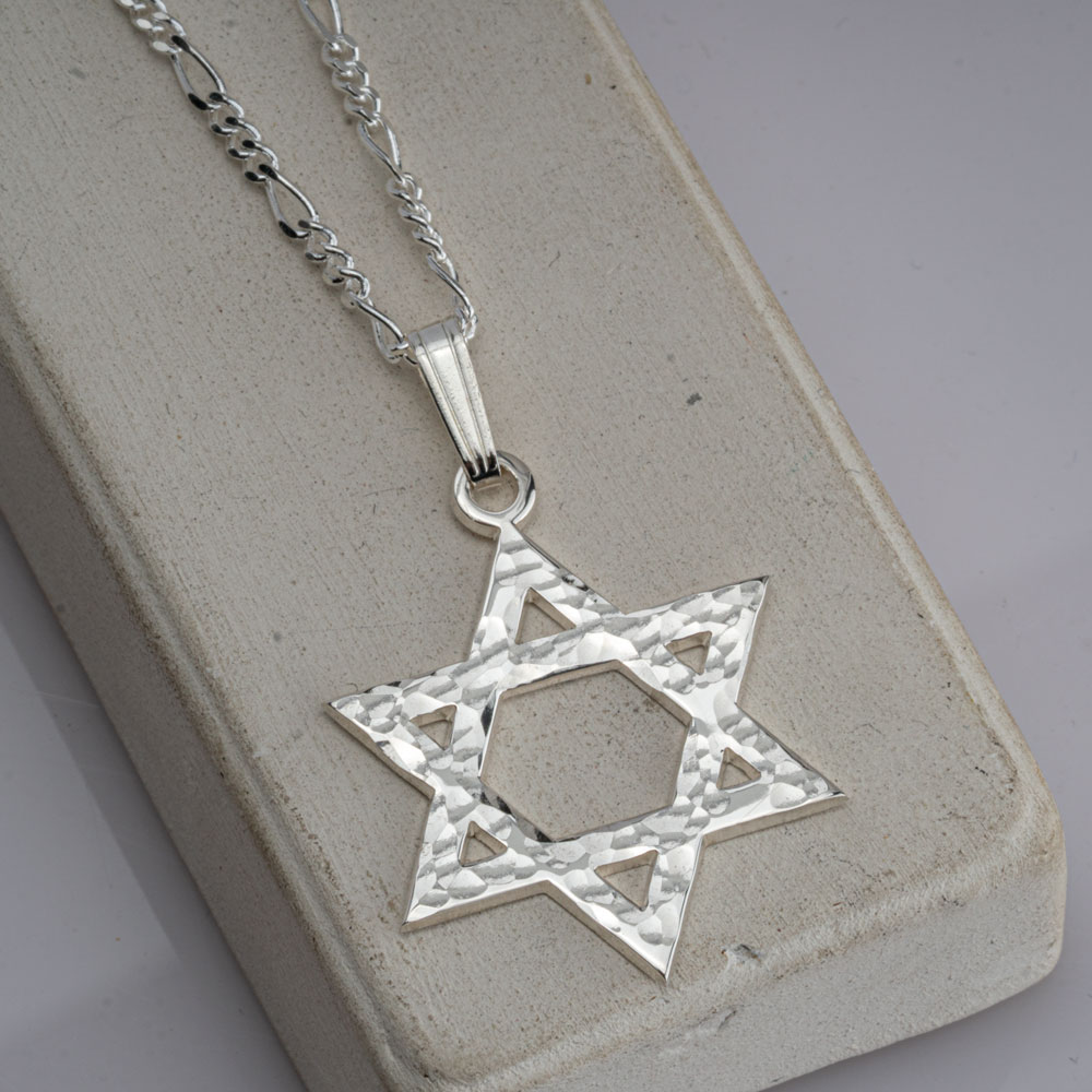 Hammered Star of David Necklace on a model - 2
