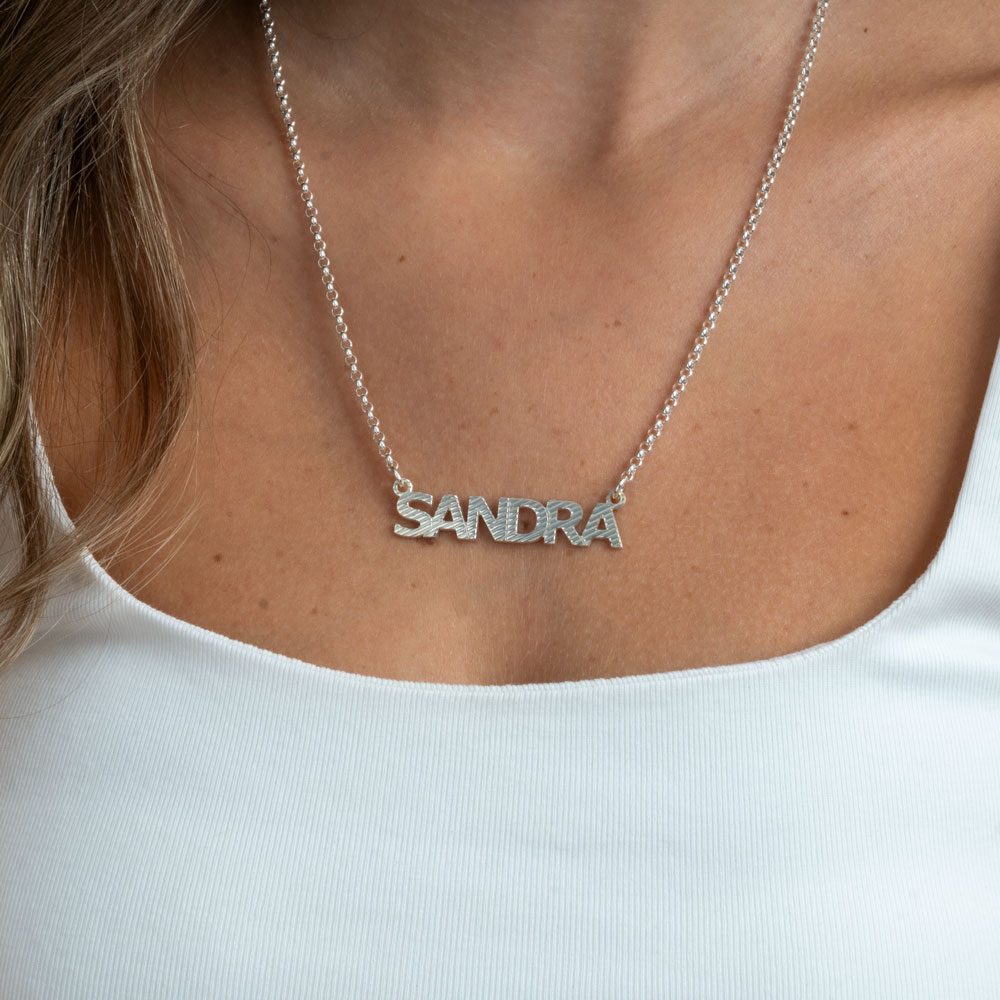 Textured Capital Letters Name Necklace on a model