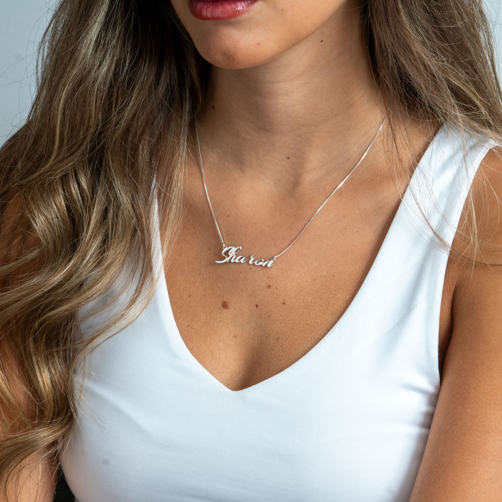 Custom Cursive Name Necklace on a model - 2