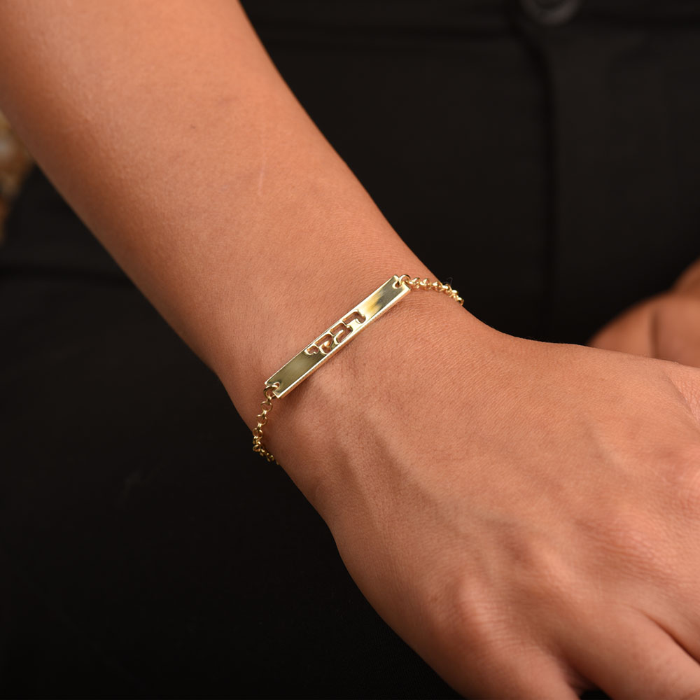 Cutout Hebrew Name Bracelet on a model
