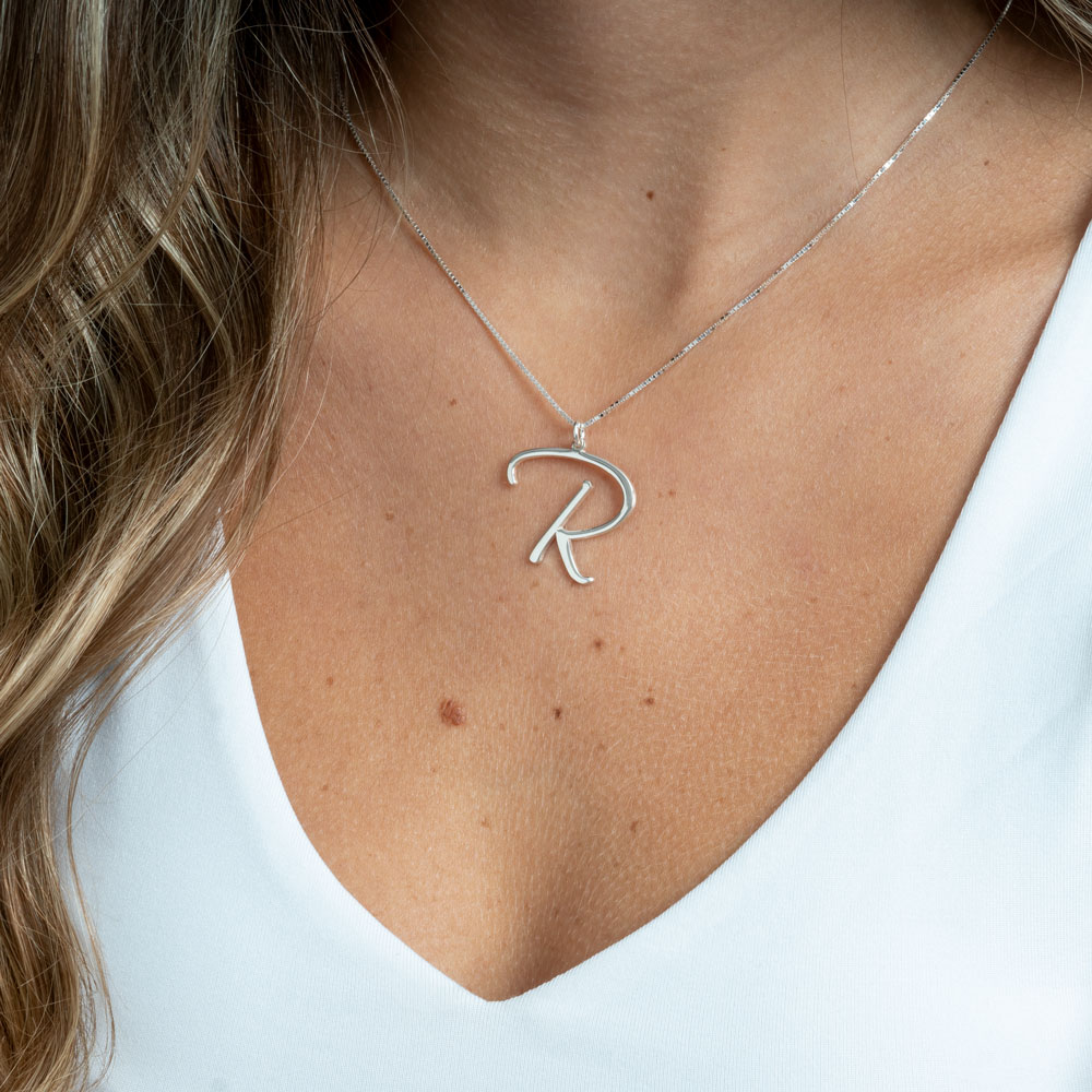 Cursive Initial Necklace on a model