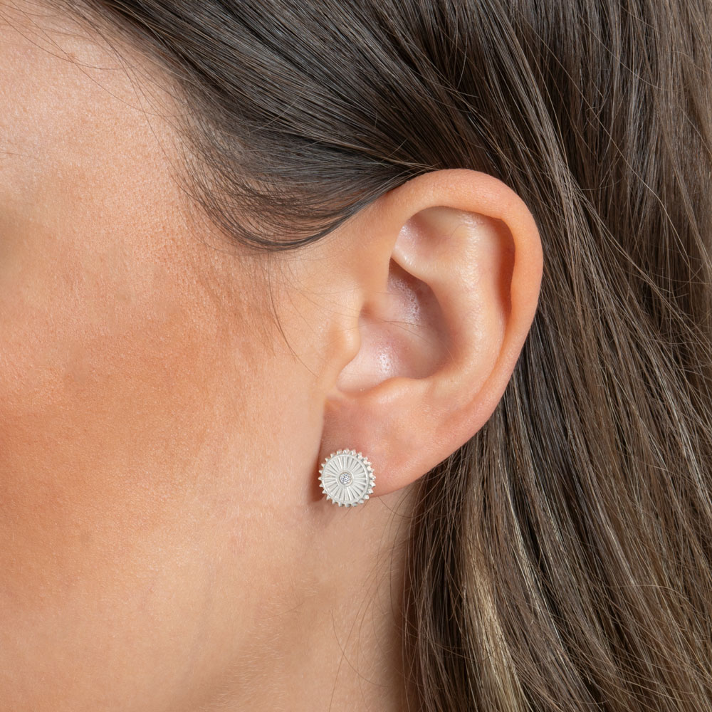 Diamond Sun Earrings on a model