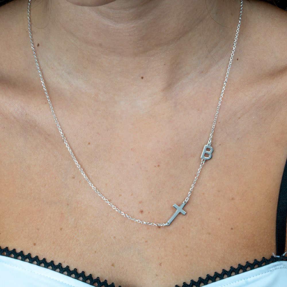 Small Cross With Sideway Initial on a model - 2