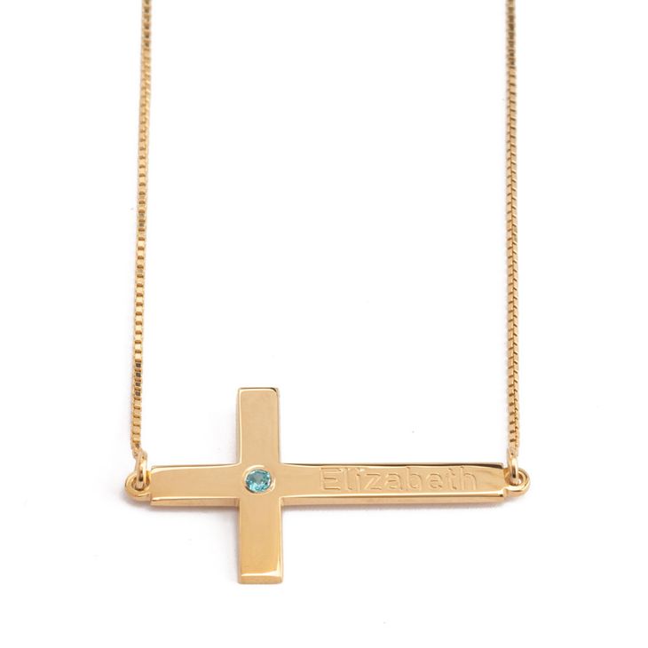 cross with birthstone and name information