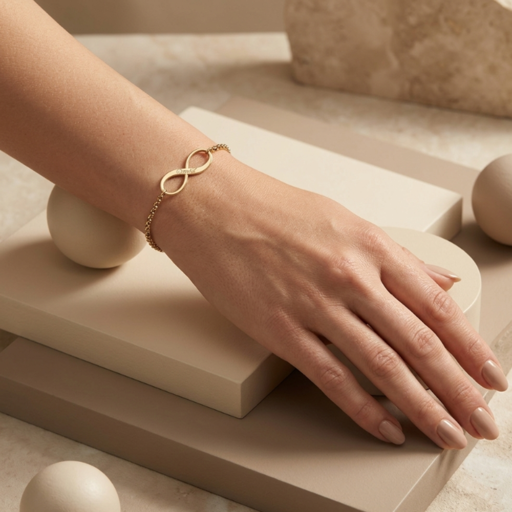 Model's wrist featuring Infinity Matching Bracelet, illustrating the timeless infinity design.