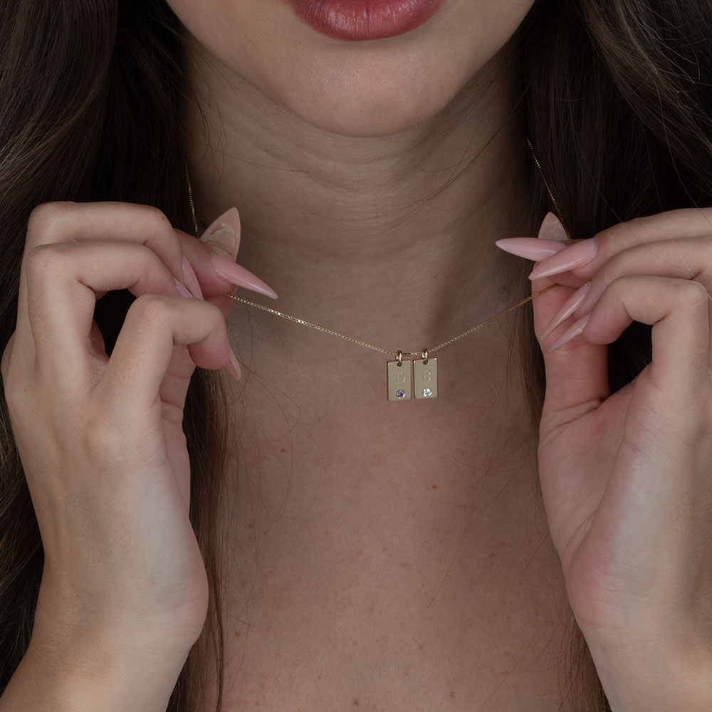 Custom Mother's Birthstone Necklace with Initial Charms on a model - 2