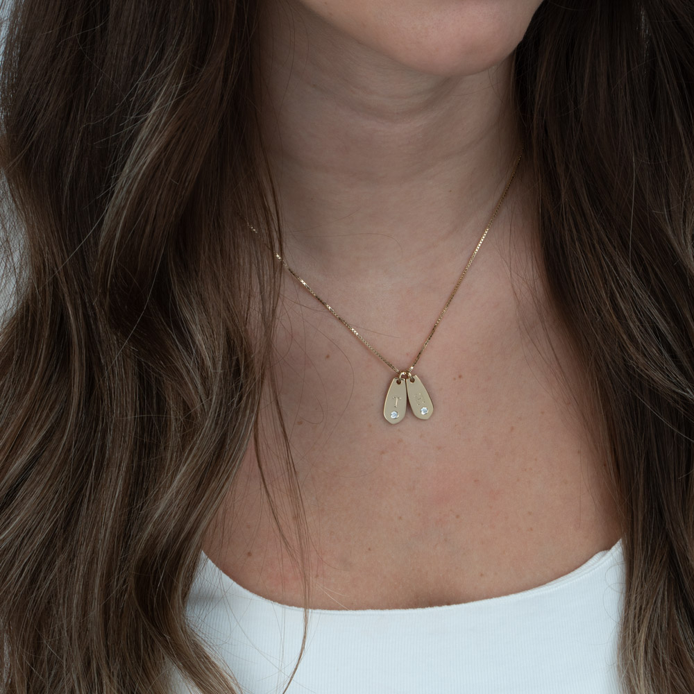 Personalized Initial Diamond Drop Necklace on a model