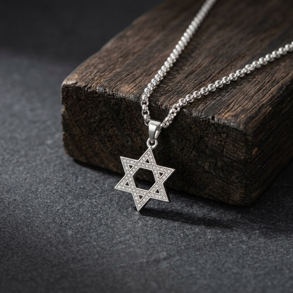 Chic model presenting the Mini Judaica Star of David Necklace with sparkling zircons, accentuating its charm.