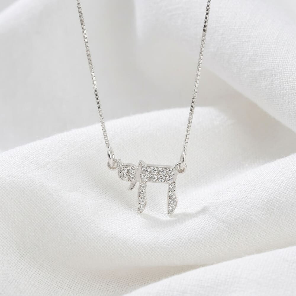 Live Pendant Mini necklace displayed on a model, enhancing her chic style