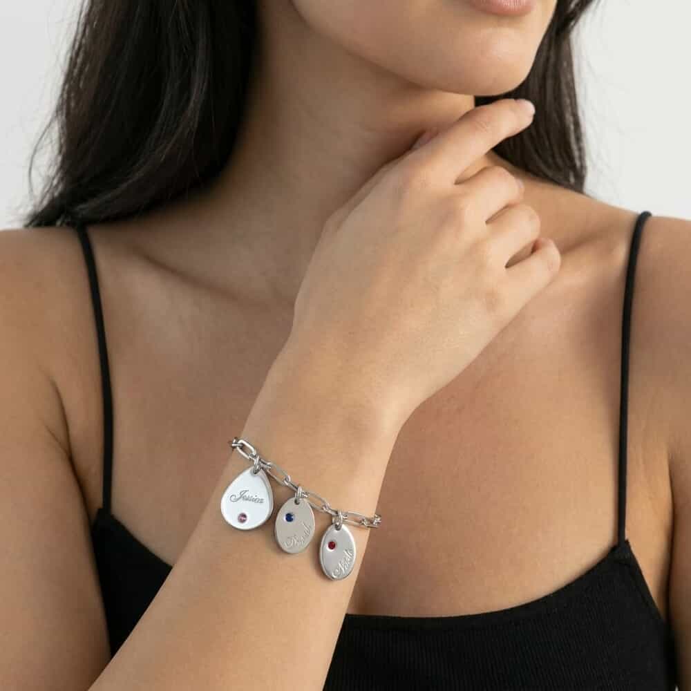 Personalized Mother's Birthstone Drop Charm Bracelet with Kids' Names on a model - 2