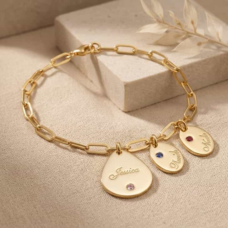 Personalized Mother's Birthstone Drop Charm Bracelet with Kids' Names on a model 3