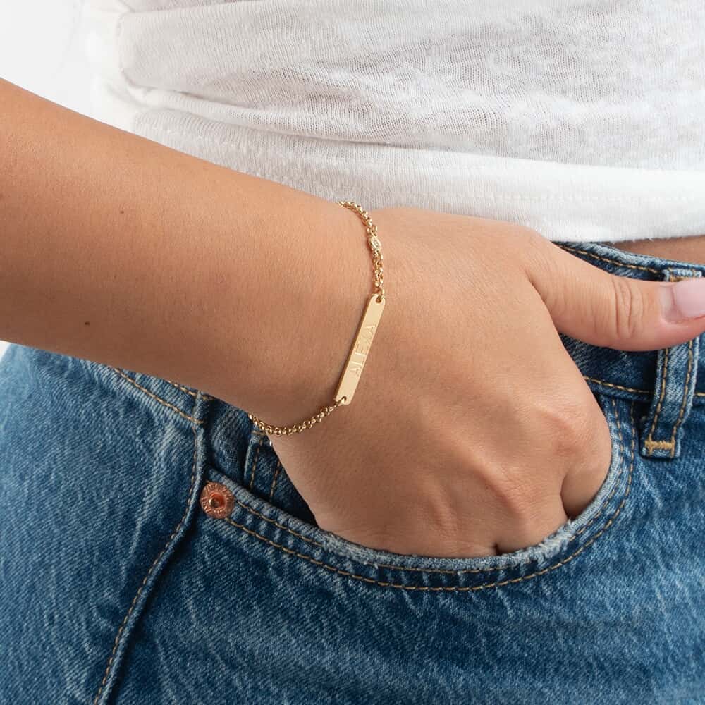 Personalized Name Bar Bracelet with Birthstone Charm on a model
