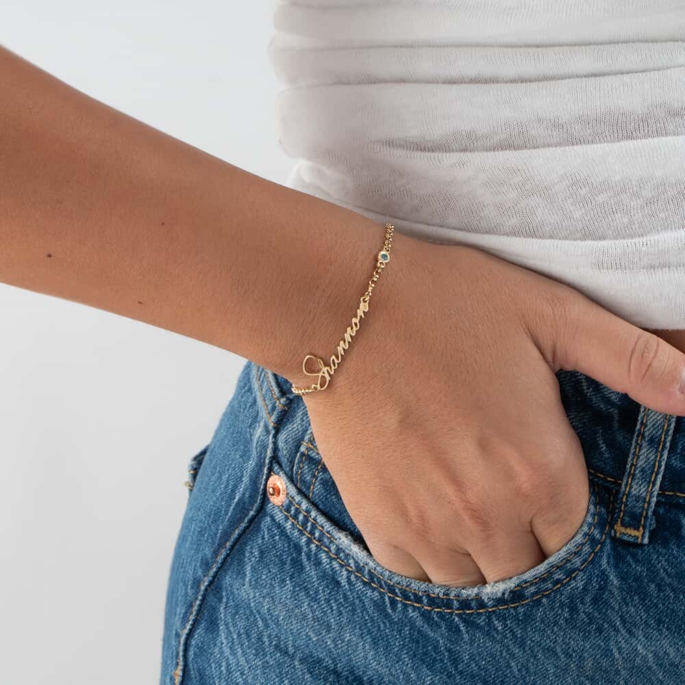 Personalized Dainty Name Bracelet with Birthstone Charm on a model