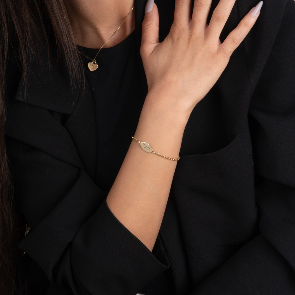 Custom Engraved Oval Bracelet with Handwriting on a model