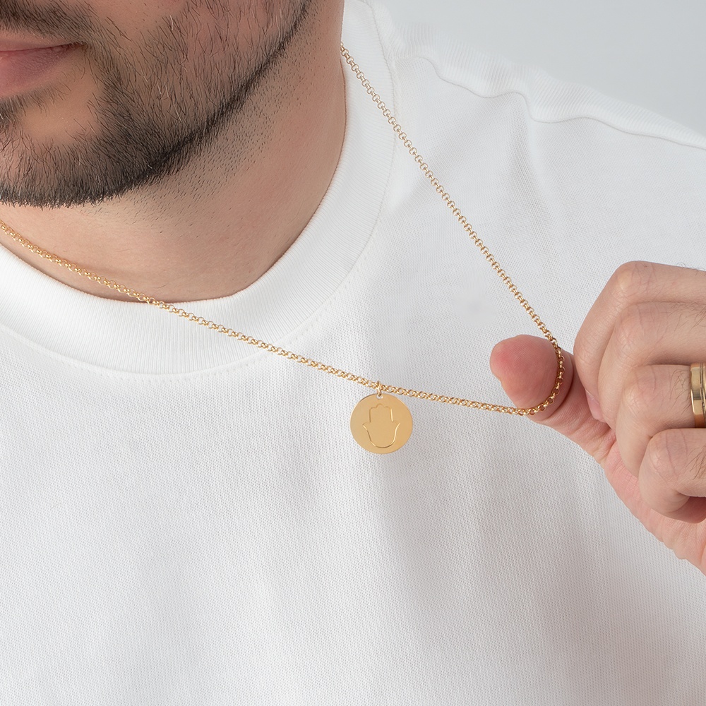 Men’s Personalized Hamsa Necklace with Hidden Message on a model