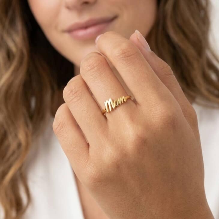 Gold Dainty Mom Ring showcased on a hand, perfect for mothers
