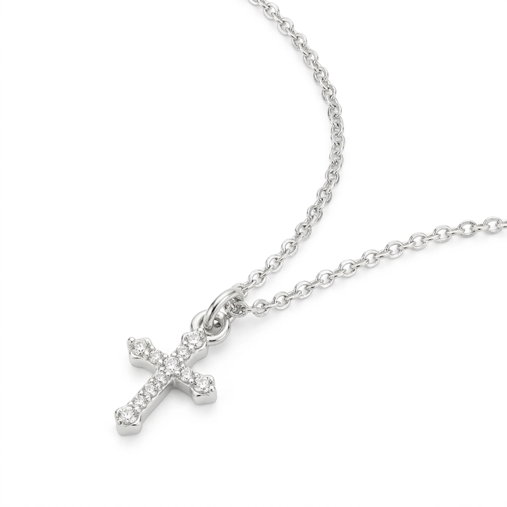 Delicate silver Small Inlaid Cross pendant with intricate design on a chain
