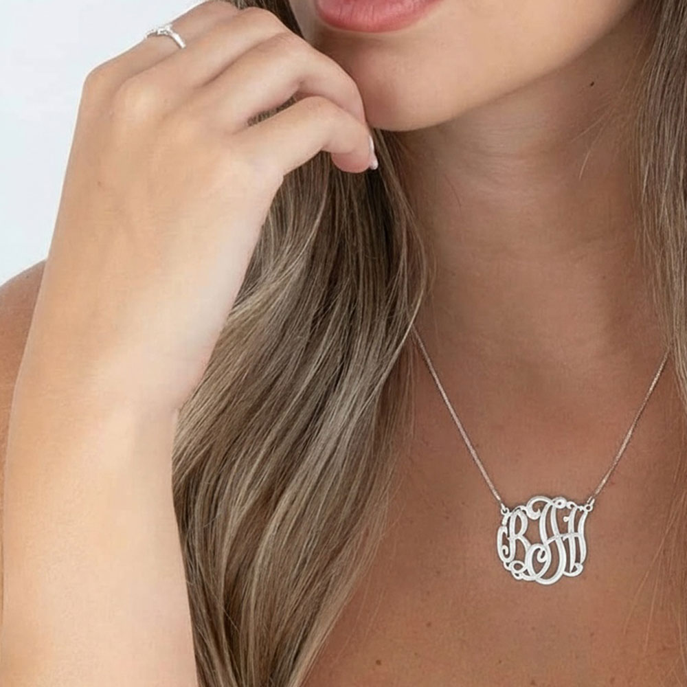 Personalized Curved Monogram Necklace with 3 Initials on a model