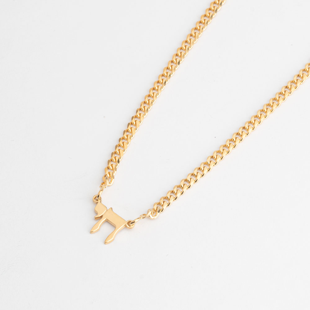 Cuban Chai Necklace on a model