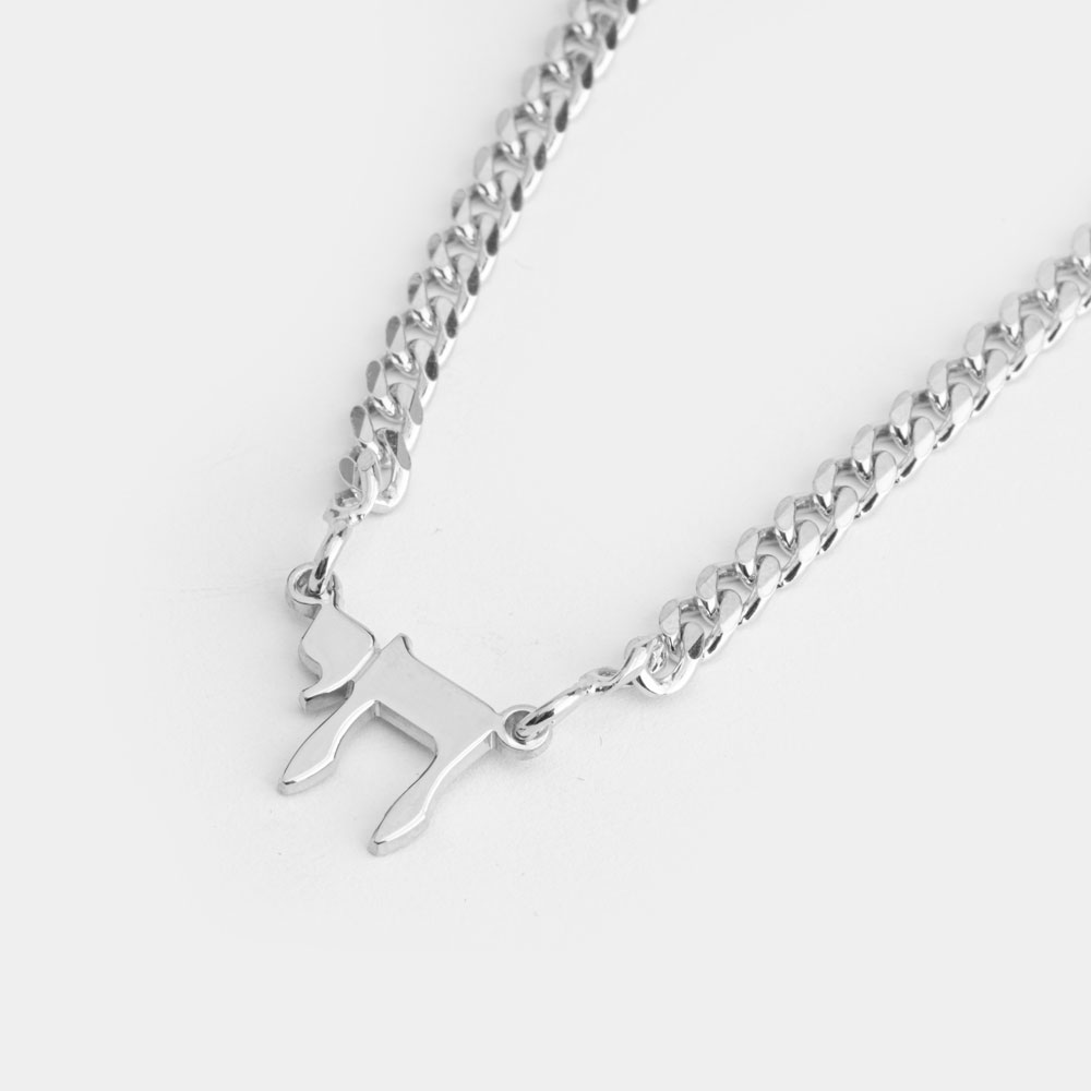 Cuban Chai Necklace on a model - 2