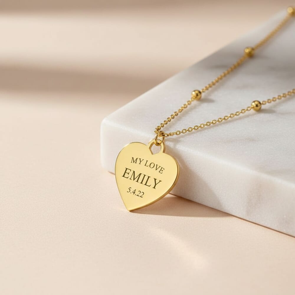 Engraved Heart Necklace with Beaded Chain on a model