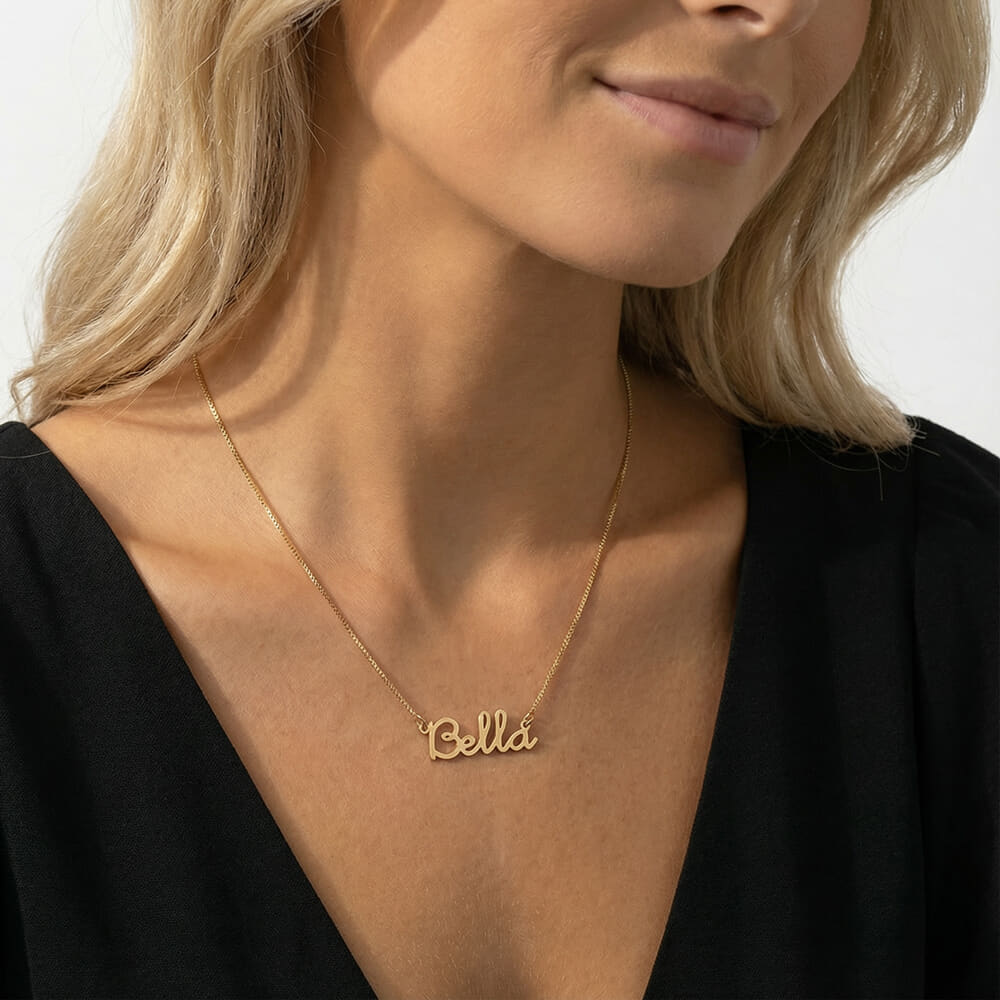 The Jolie Script Name Necklace on a model - 2