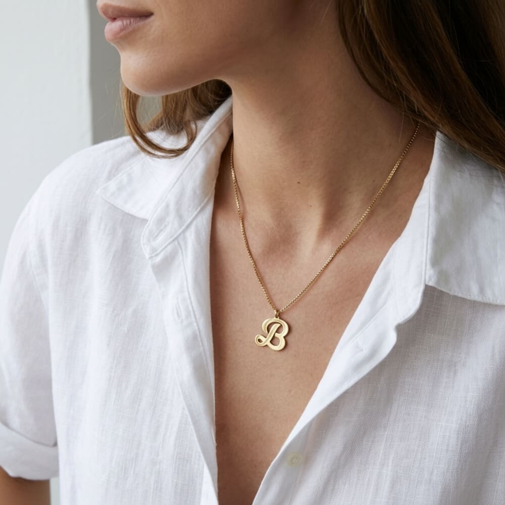 Personalised Cursive Letter Pendant on a model
