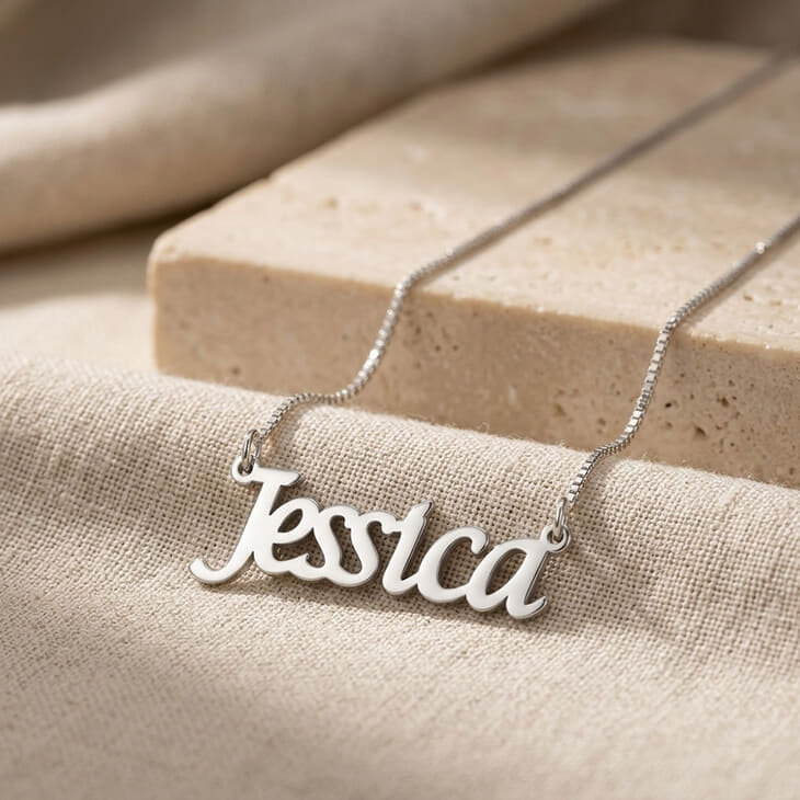 Elegant silver name necklace with the name Jessica in beautiful cursive font.