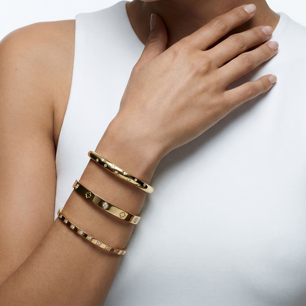 Elegant Clover Zircon Bangle Bracelet on a model