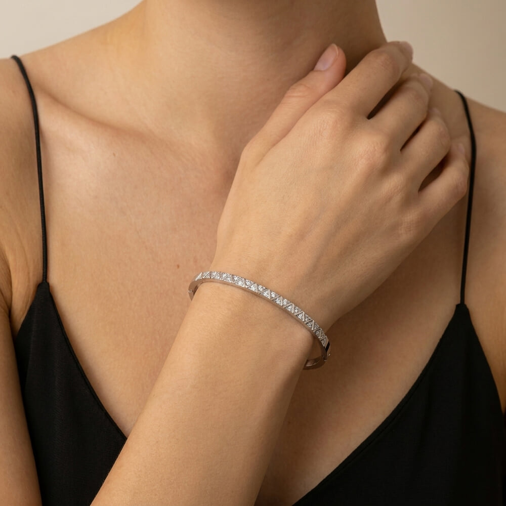 Stylish model adorned with the Full Zircon Bangle Bracelet, presenting a refined fashion statement