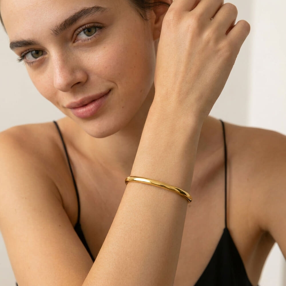 Slim Open Bangle Bracelet adorned by a model, showcasing contemporary elegance