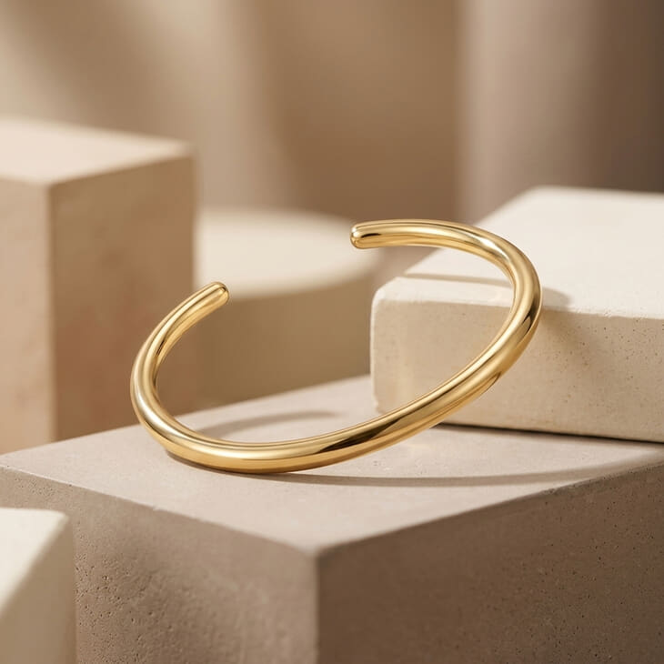 Model adorned with the Slim Open Bangle Bracelet, emphasizing modern simplicity