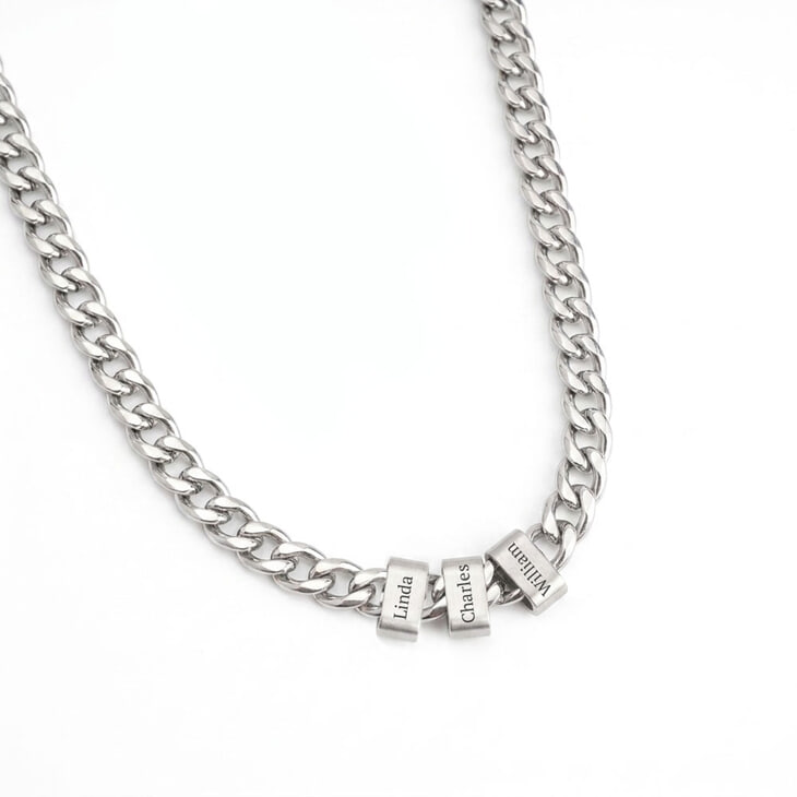 Detailed look at silver engraved beaded Cuban chain necklace