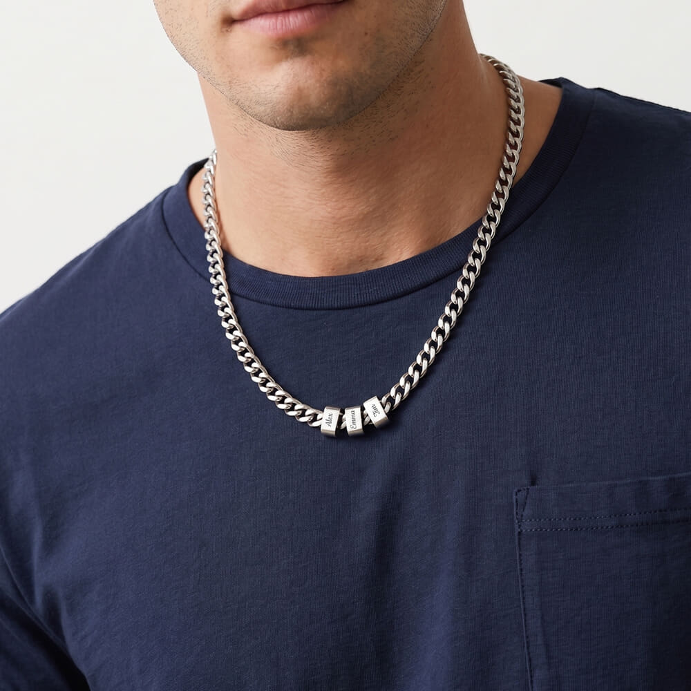 Model featuring a personalized engraved beaded Cuban chain necklace with a modern look